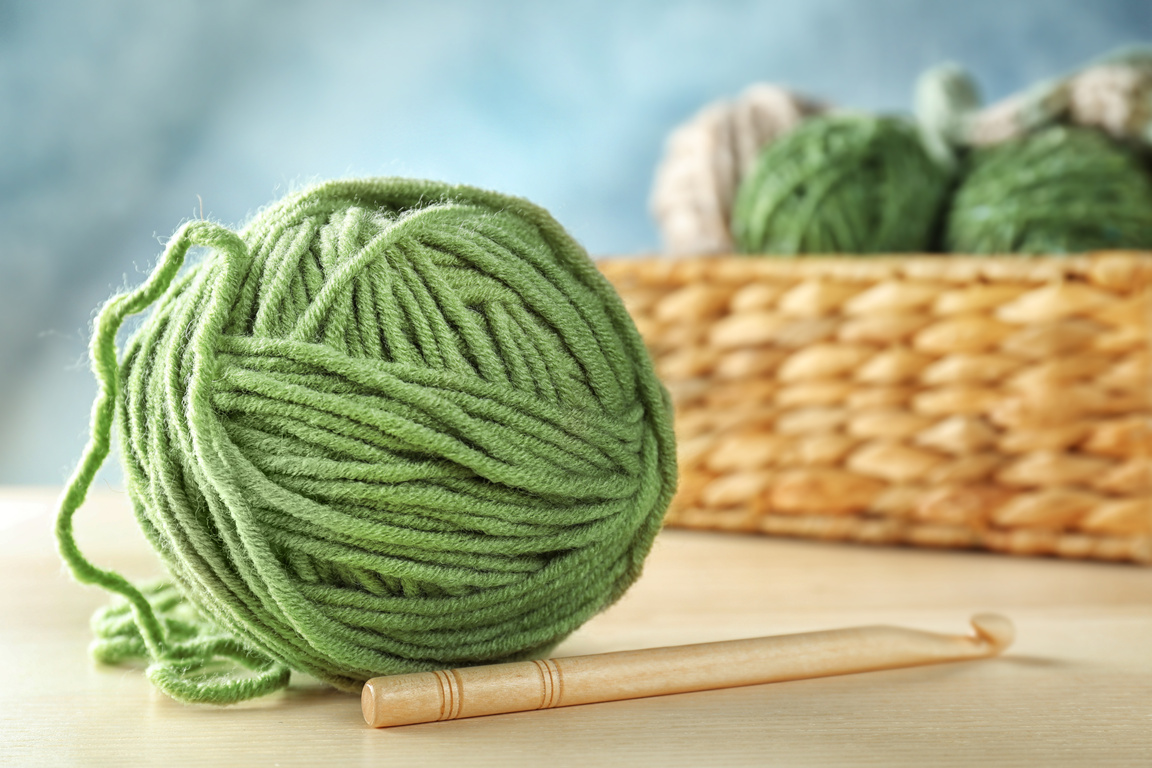 Green Ball of Knitting Yarn and Hook